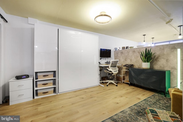 home office featuring hardwood / wood-style flooring