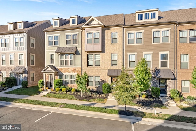 view of building exterior with a residential view