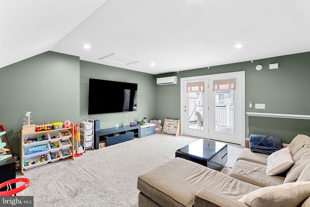 living area featuring lofted ceiling, recessed lighting, a wall mounted AC, attic access, and carpet flooring