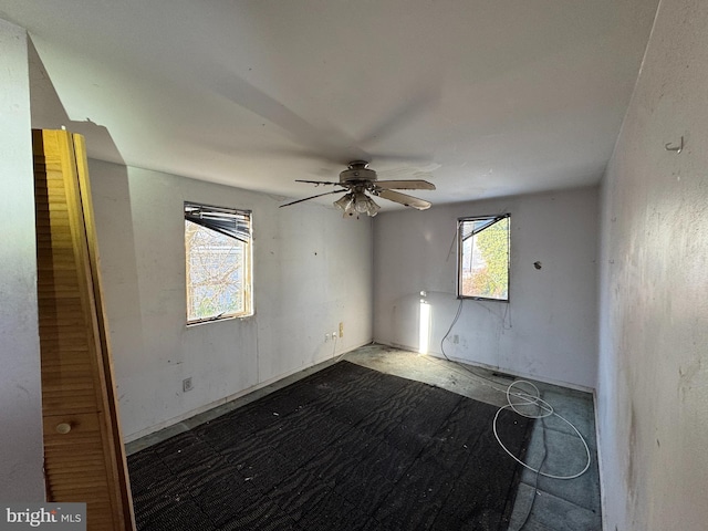 unfurnished room featuring ceiling fan