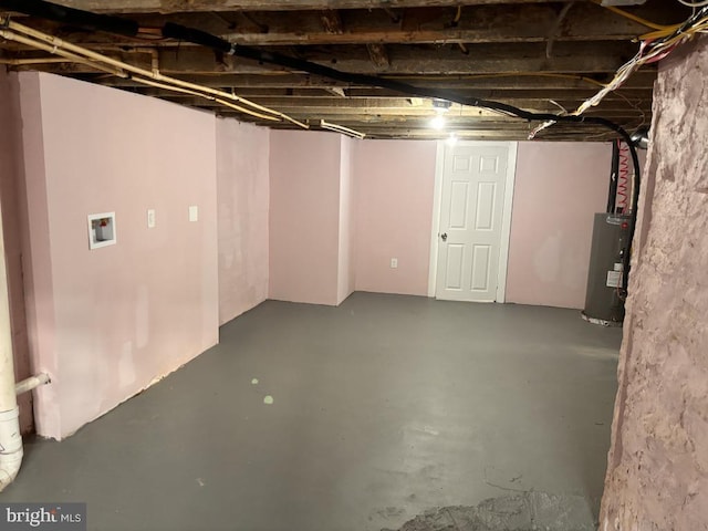 unfinished basement with water heater