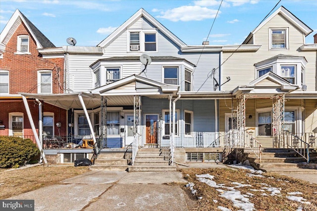 view of property with covered porch