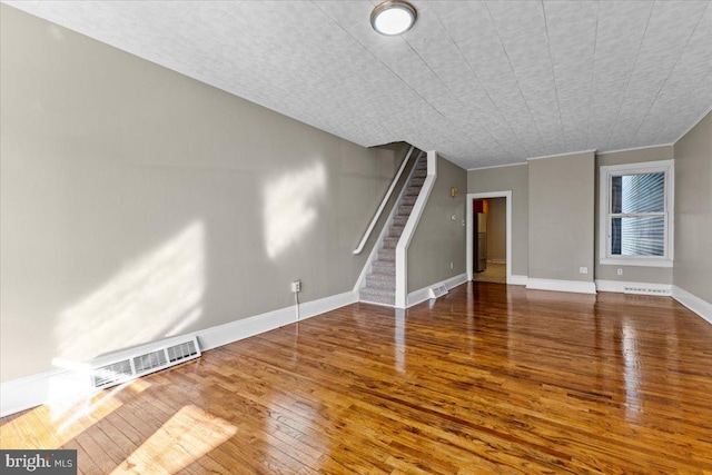 interior space with hardwood / wood-style floors