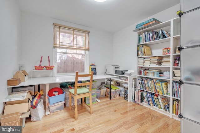 rec room featuring light wood-type flooring