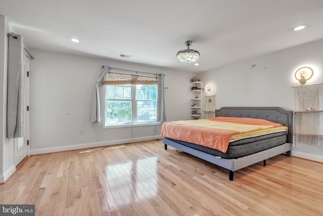 bedroom featuring light hardwood / wood-style floors