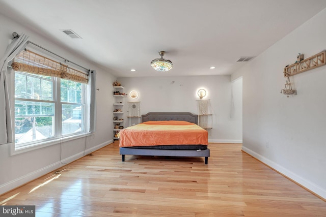 bedroom featuring light hardwood / wood-style floors