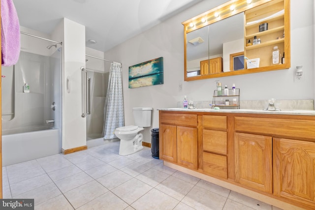 full bathroom with tile patterned flooring, vanity, shower / tub combo, and toilet