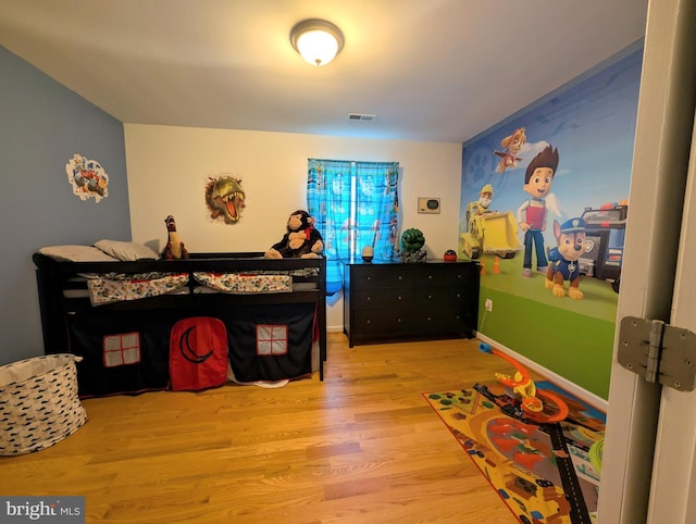 bedroom featuring light wood-type flooring