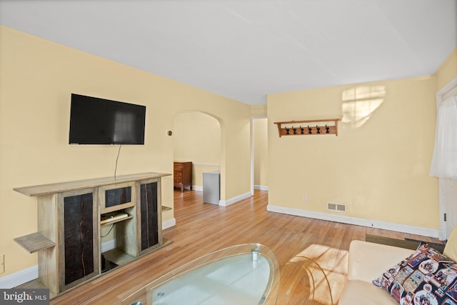 living room with hardwood / wood-style flooring