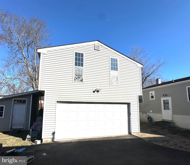 view of home's exterior with a garage