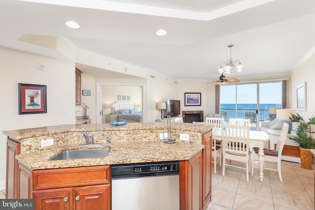 kitchen featuring dishwasher, sink, ornamental molding, ceiling fan, and light stone counters