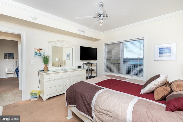 bedroom with crown molding and light carpet