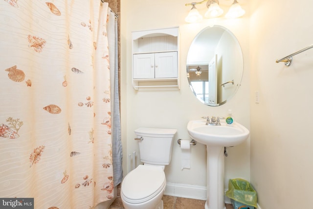 bathroom featuring sink and toilet