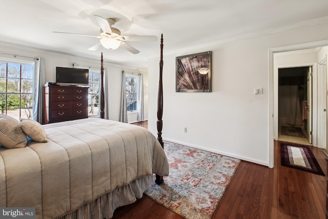 bedroom with ceiling fan and dark hardwood / wood-style flooring