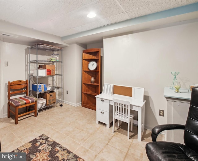 office featuring a paneled ceiling