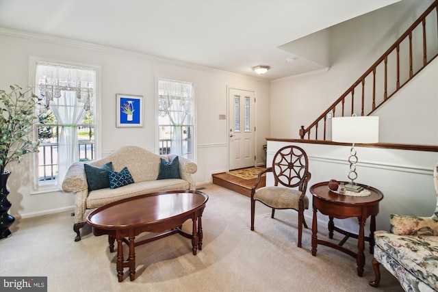 carpeted living room featuring crown molding