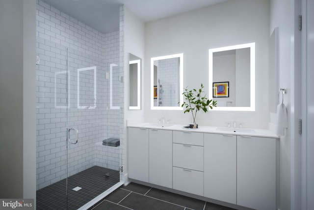 bathroom featuring tile patterned flooring, an enclosed shower, and vanity