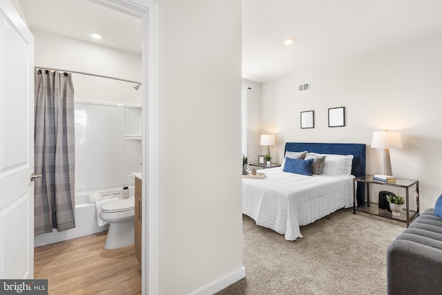 bedroom with light wood-type flooring