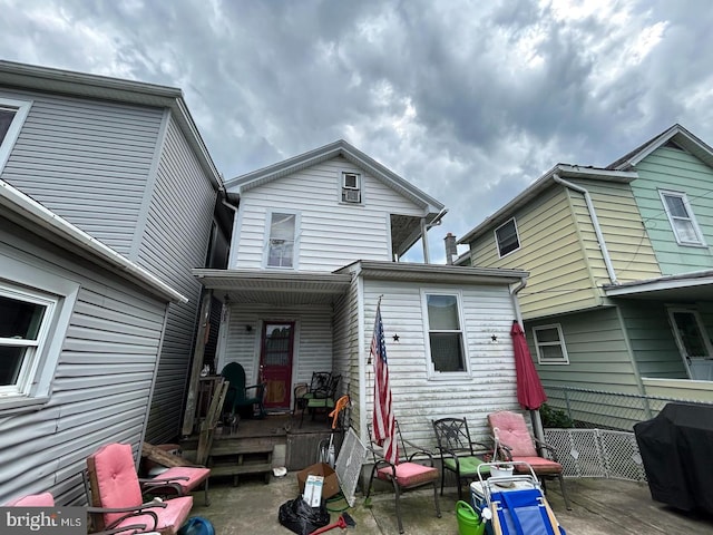 rear view of property with a patio