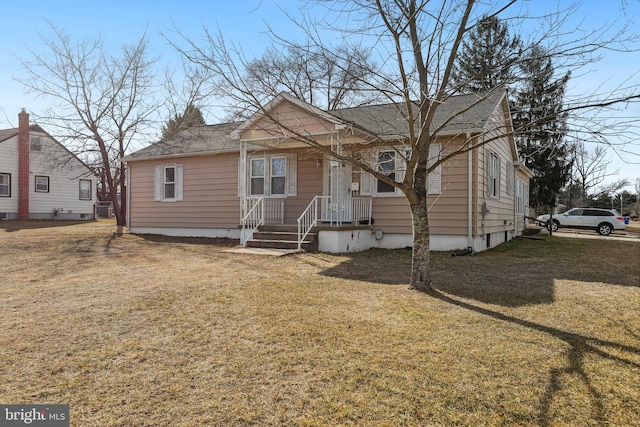 bungalow with a front lawn