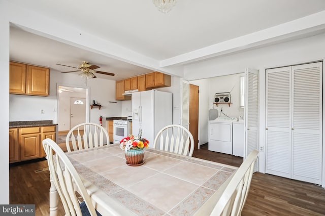 dining area with beam ceiling, dark hardwood / wood-style floors, washer and dryer, and ceiling fan