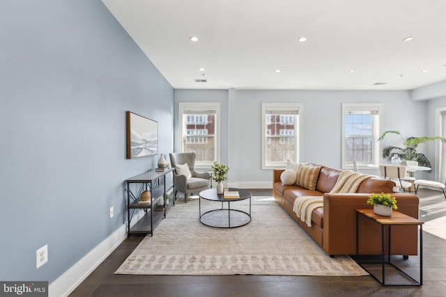 living room featuring dark hardwood / wood-style floors