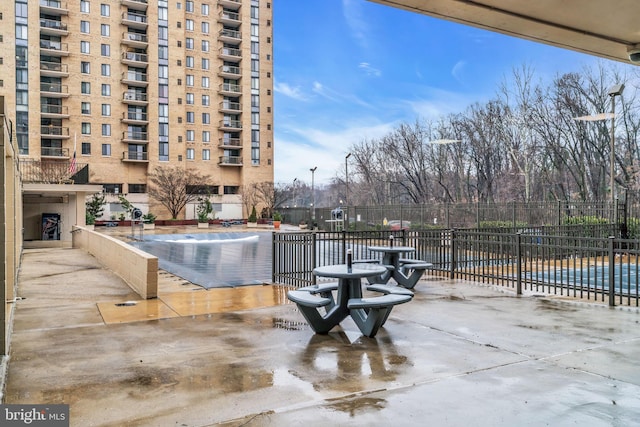 view of swimming pool featuring a patio area