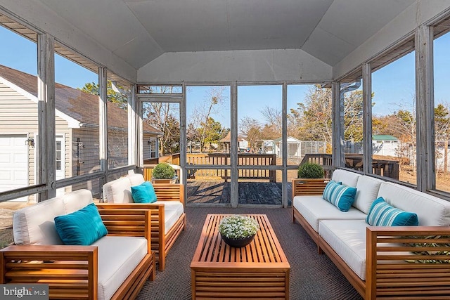 sunroom with lofted ceiling