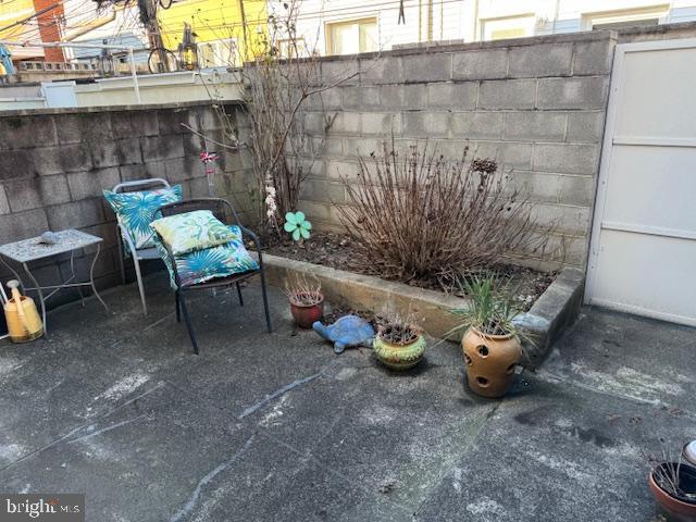 view of patio / terrace with fence