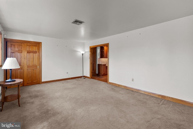 view of carpeted spare room