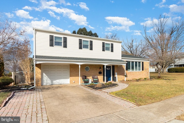 front facade featuring a garage, a front lawn, and covered porch