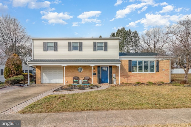 view of front of house with a garage and a front yard