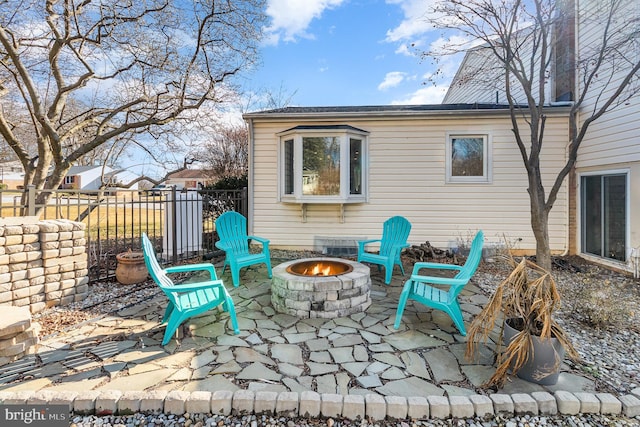 view of patio / terrace featuring an outdoor fire pit