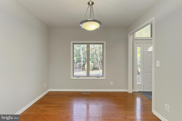 entrance foyer featuring hardwood / wood-style floors