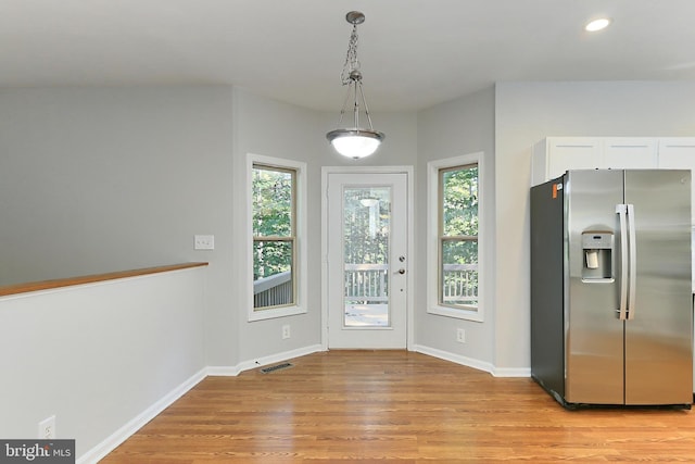 doorway featuring light hardwood / wood-style flooring