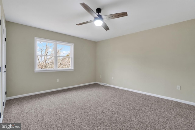 unfurnished room with carpet floors and ceiling fan