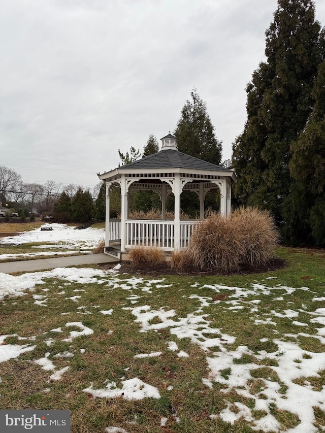 view of community featuring a gazebo and a lawn