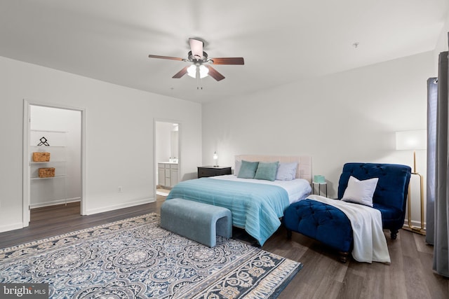 bedroom featuring ceiling fan, wood-type flooring, and ensuite bathroom