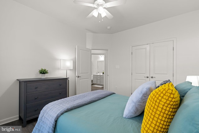 bedroom featuring dark hardwood / wood-style flooring, a closet, and ceiling fan