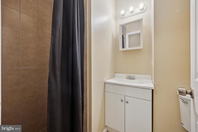 bathroom with vanity and a shower with curtain