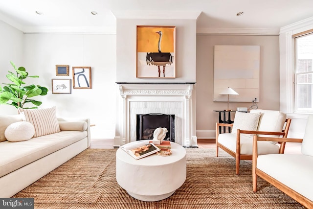 living room featuring crown molding and wood-type flooring