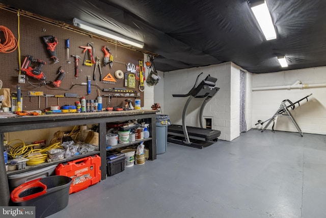 basement with a workshop area