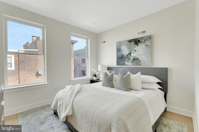 bedroom featuring light hardwood / wood-style flooring