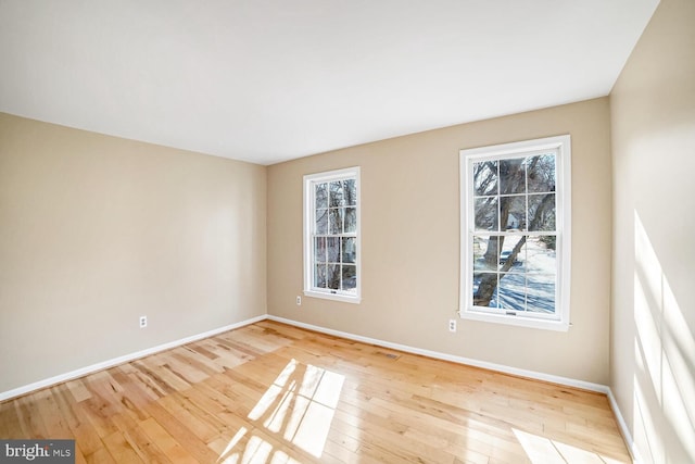 empty room featuring light hardwood / wood-style floors