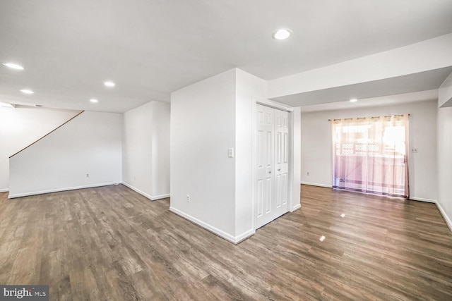 bonus room featuring dark hardwood / wood-style flooring