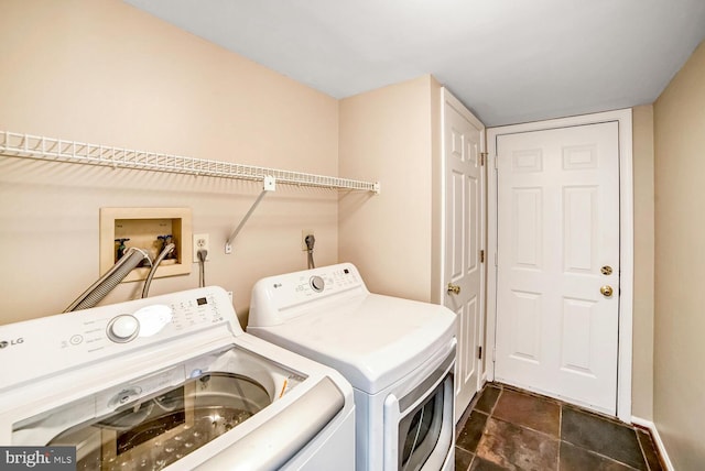 laundry area featuring separate washer and dryer