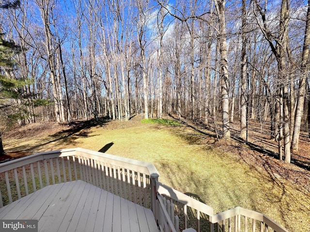 view of yard with a wooden deck