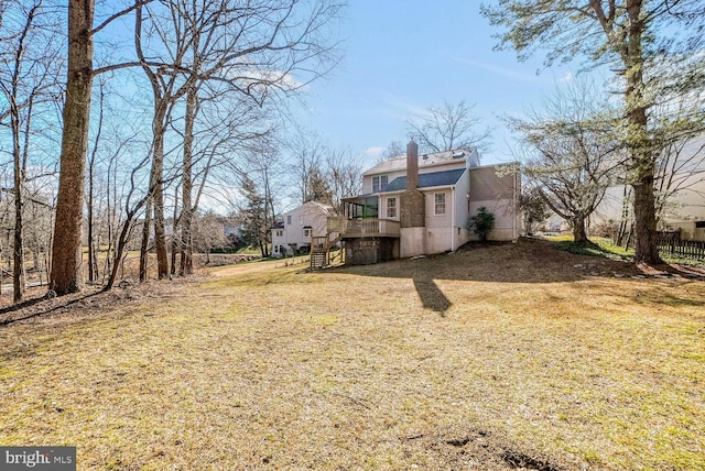 view of yard with a deck