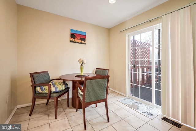 dining room with light tile patterned floors