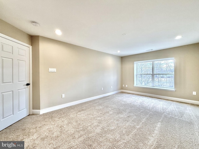 view of carpeted spare room